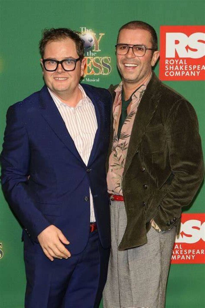 Alan Carr is dating a toyboy celebrity crimper and has already introduced him to pal Adele