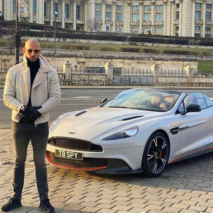 Andrew Tate with his car