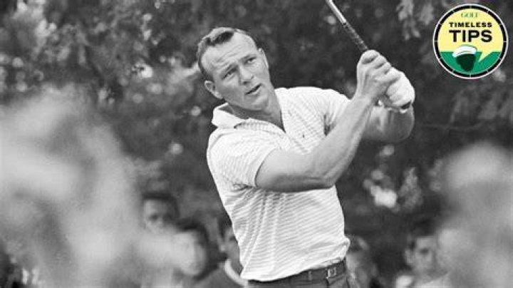 Arnold Palmer playing golf
