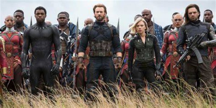 Avengers standing looking intense