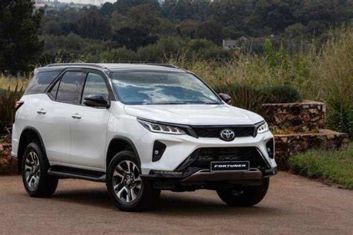 Babushan drives his Toyata Fortuner car