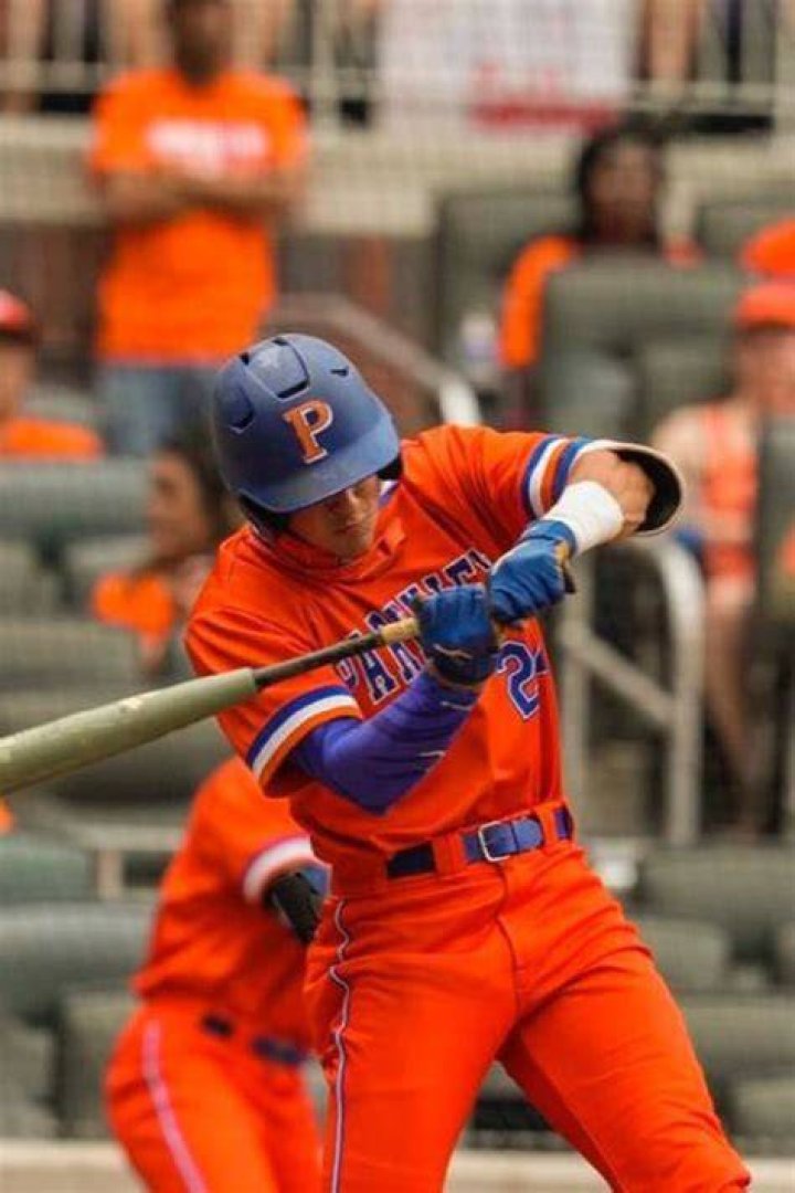 Baseballer Colin Houck Batting In The Field
