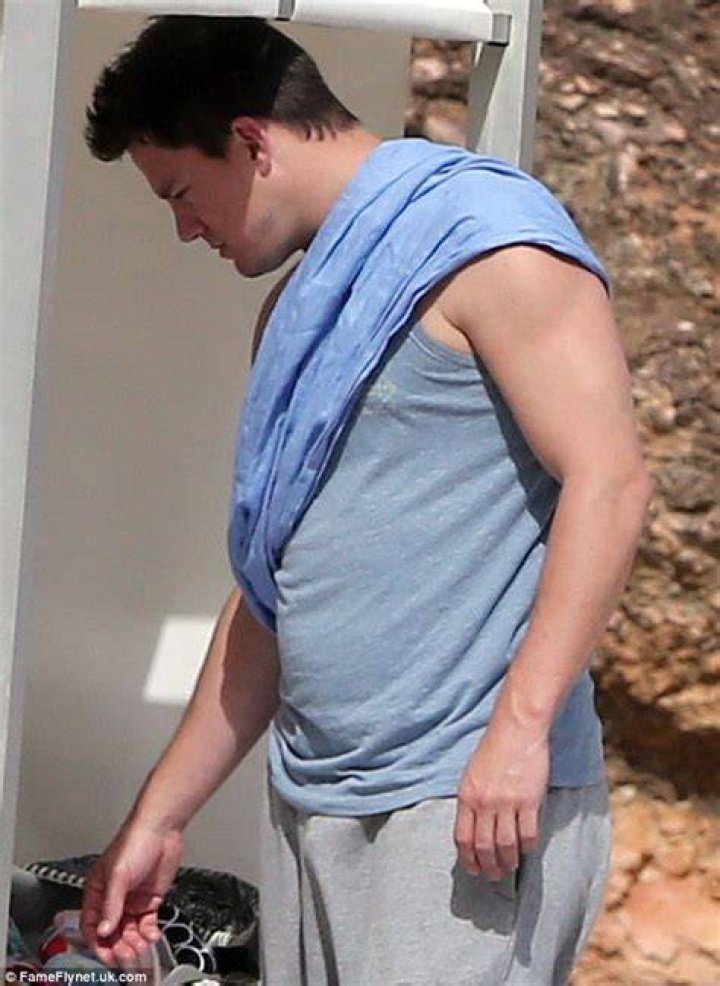 Channing Tatum shows fuller figure on beach outing with trim wife Jenna