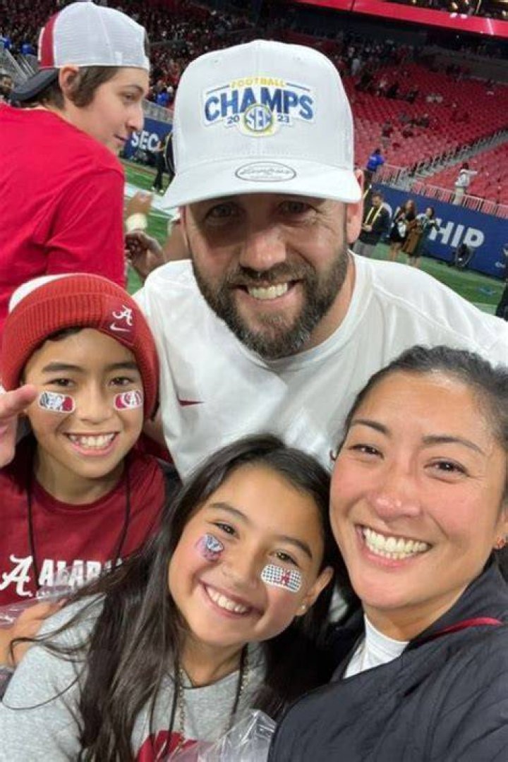 Coleman Hutzler With His Wife, Cobey And His Two Kids Celebrating Alabama's Latest Milestone