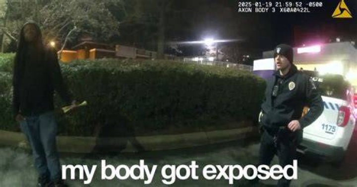 Cops have released an image of a man seen running from the scene of a murder yesterday with a knife in his left hand. The blade is circled in this image
