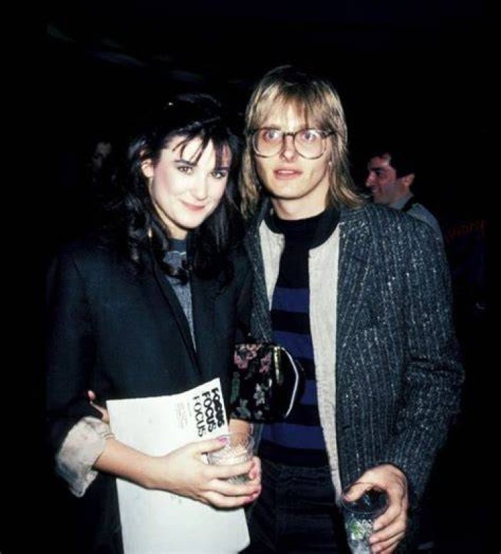  Demi Moore and Philip Tanzini snogging at his 15th birthday party