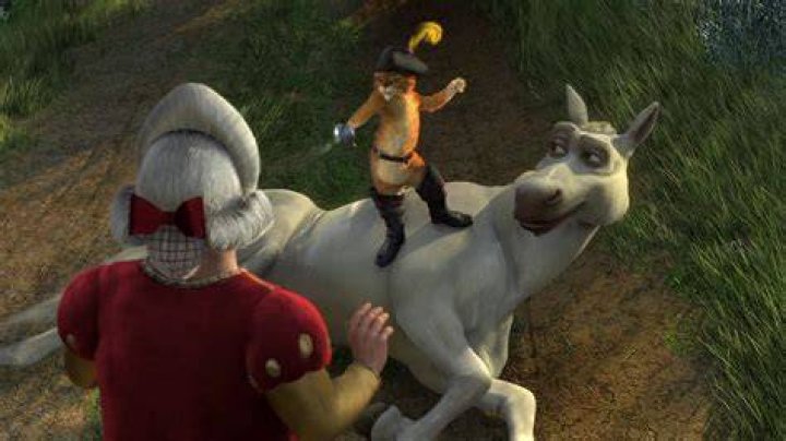 Donkey and Puss standing with the Ogre army in Shrek 4