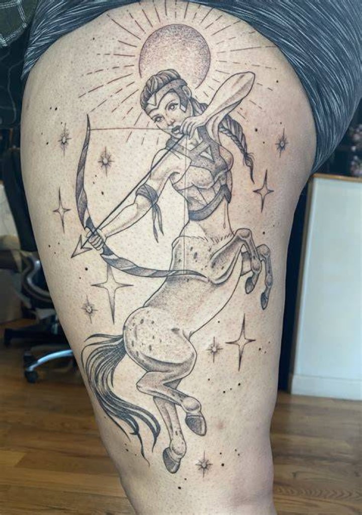 Female centaur face tattoo