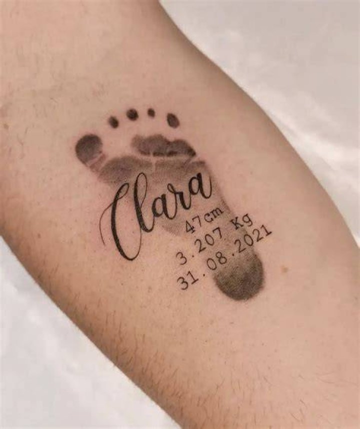 Foot print tattoo