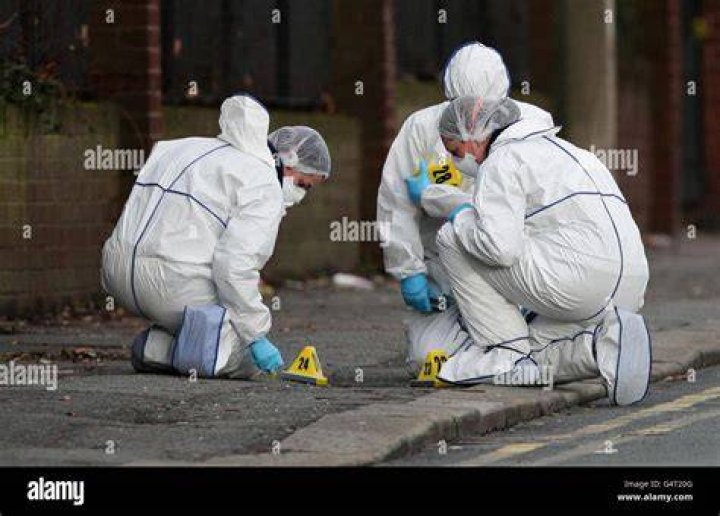 Forensic officers attend the scene of the attack in Newport Road, New Bradwell, Milton Keynes