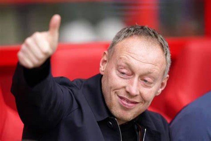 Forest boss Steve Cooper consoles scorer Hudson-Odoi after subbing him