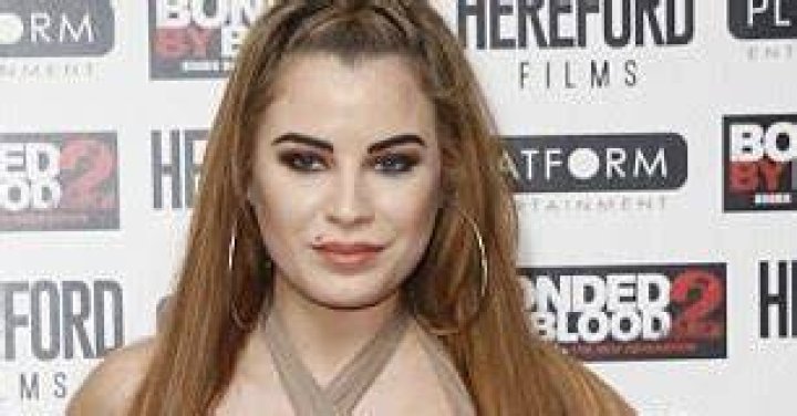 Former Playboy model Carla Howe said Tate tried to lure her to Romania