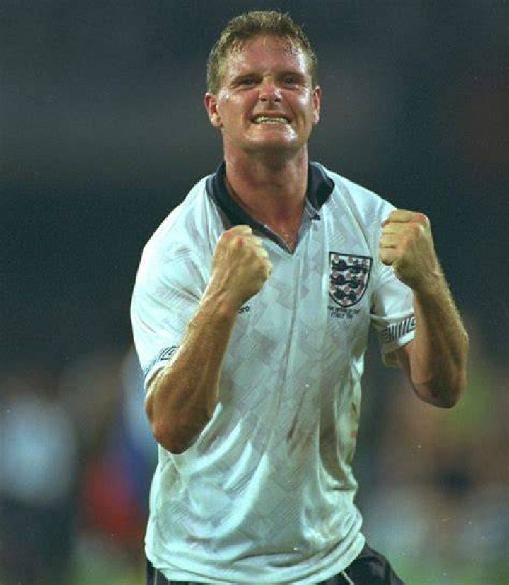  Gazza shows off a catch and is one of many footballers to love fishing