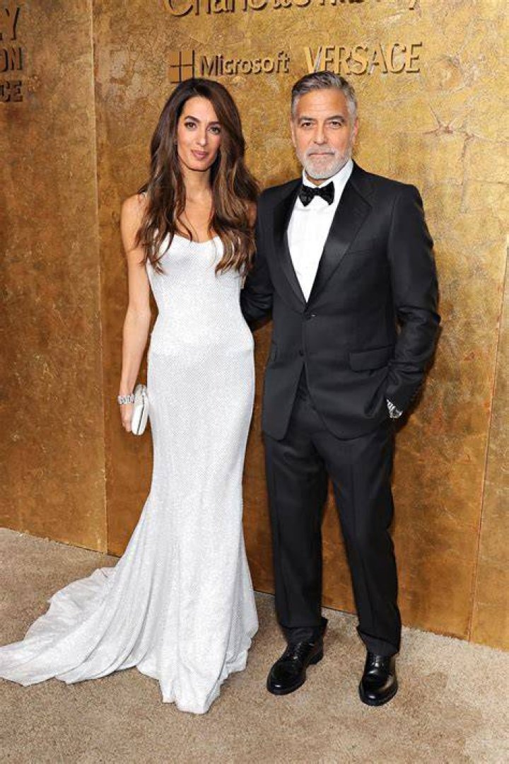 George and his wife with their pet dog