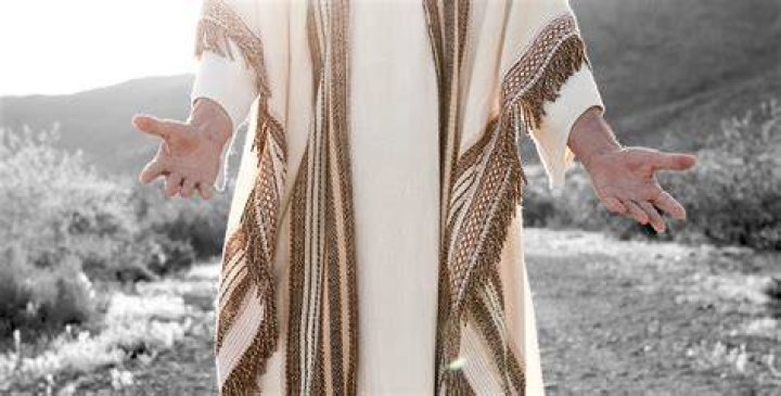 He wore a white cloth, fetters around his ankles and welt marks were painted on his back
