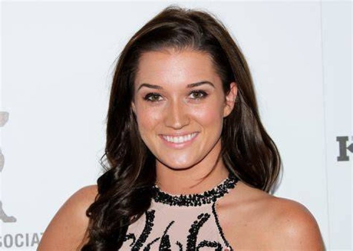 Jade Roper poses on the red carpet