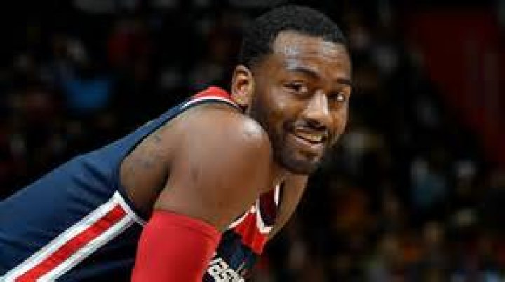 John Wall with his pet dogs