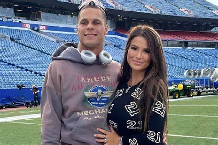 Jordan Poyer With His Wife & Daughter