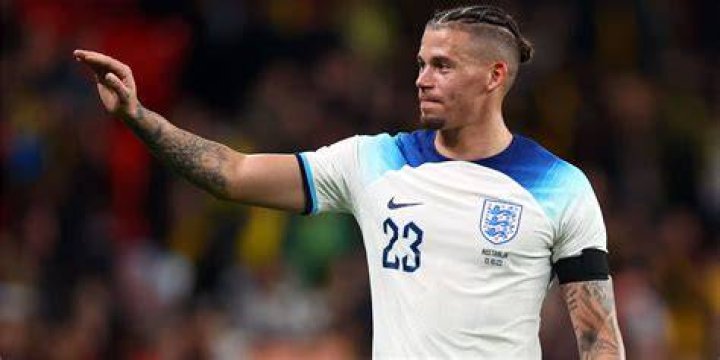 Kalvin Phillips wore a white T-shirt, brown shorts and Adidas trainers