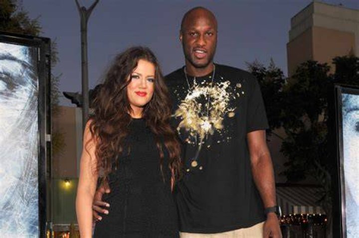 Khloe Kardashian and Lamar Odom in their wedding dress during the ceremony