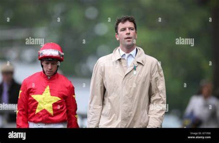 Knight walks behind jockey Jim Culloty and the legendary Best Mate after winning a third-straight Gold Cup