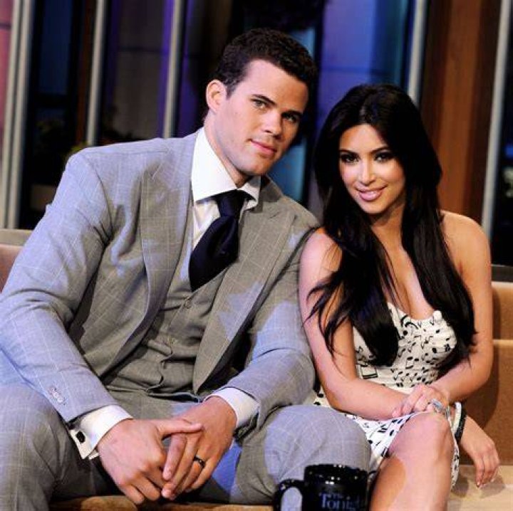 Kris Humphries kissing his bride Kim Kardashian during their marriage ceremony