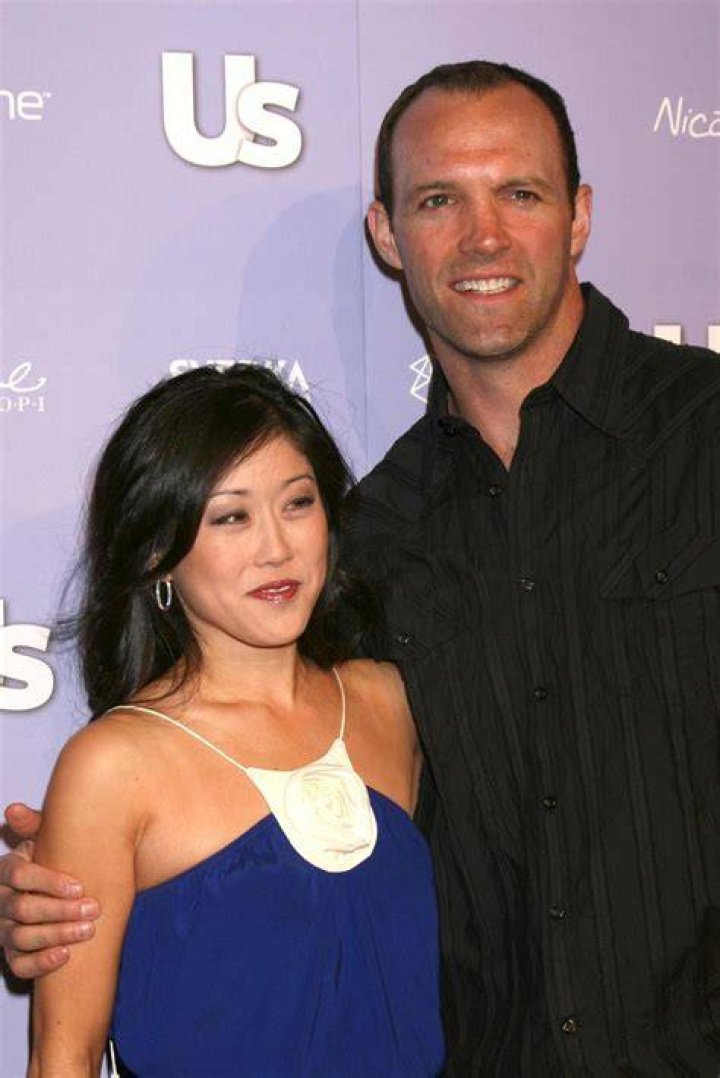Kristi Yamaguchi And Her Husband Brent Hedican Pictured Celebrating Christmas With Their Daughters, Emma And Keara In 2022