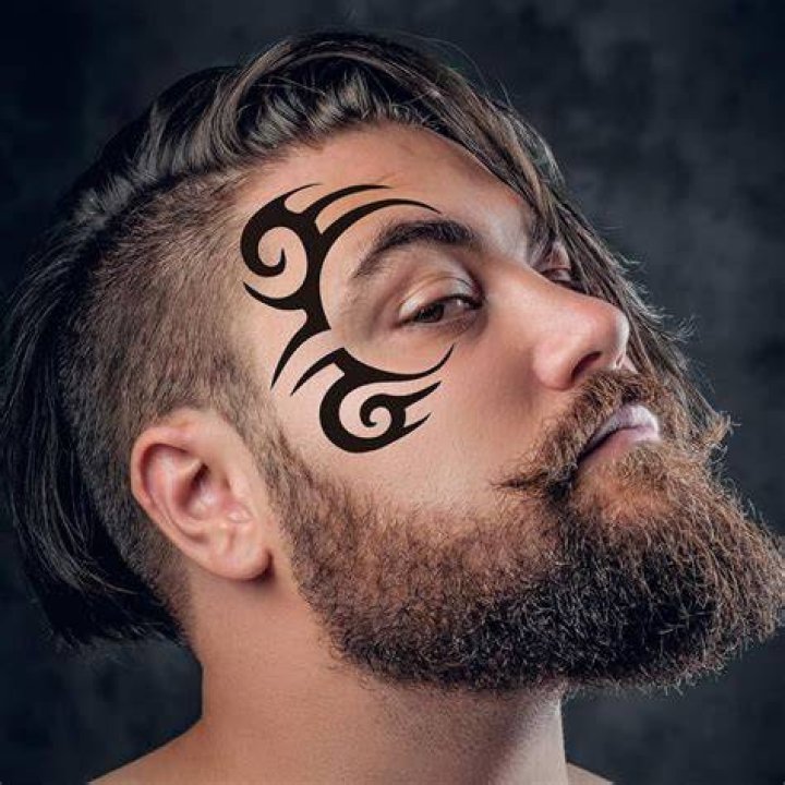 Male Tribal Face Tattoo anita_sinko
