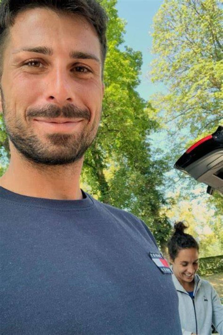 Marco Takes A Quick Selfie With Martina In The Background In July 2019