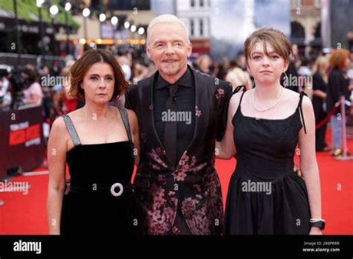 Maureen Pegg, from left, Simon Pegg, and Matilda pegg pose for