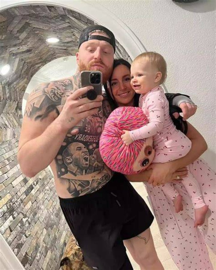 Maxx with his wife & daughter