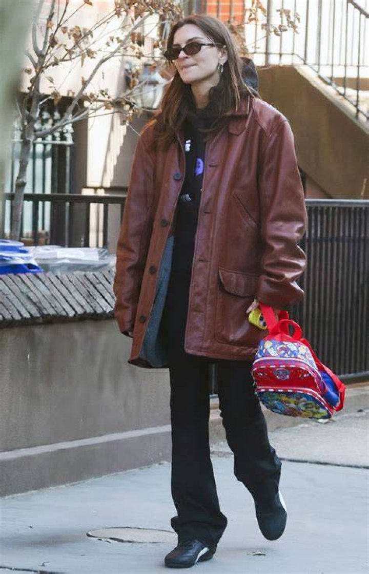 Model Emily Ratajkowski was spotted out in yellow trainers, babby green trousers and a turquoise top