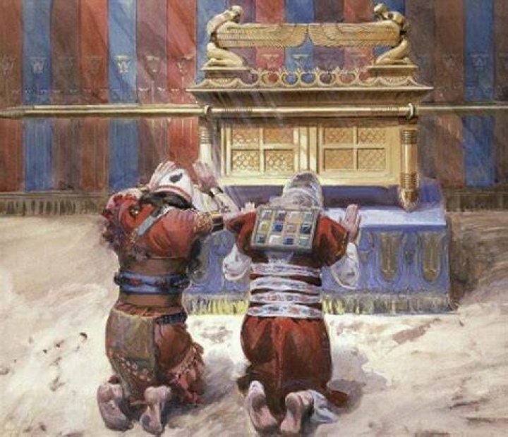 Moses and Joshua bowing before the Ark