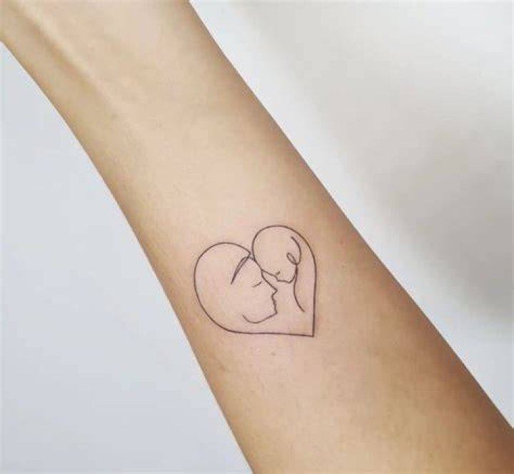 Mother and heart tattoo