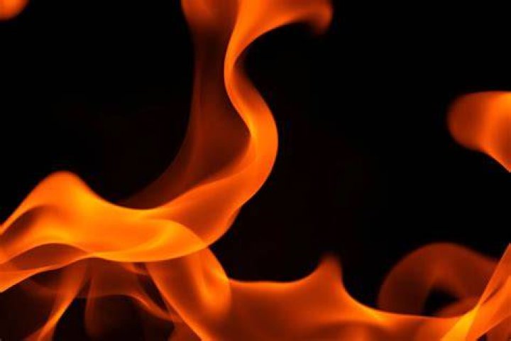  Orange flames could be seen erupting from the paper mill blaze