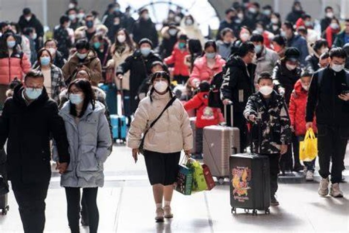  Passengers arriving from Wuhan were given a leaflet &shy;advising them to seek treatment if feeling ill