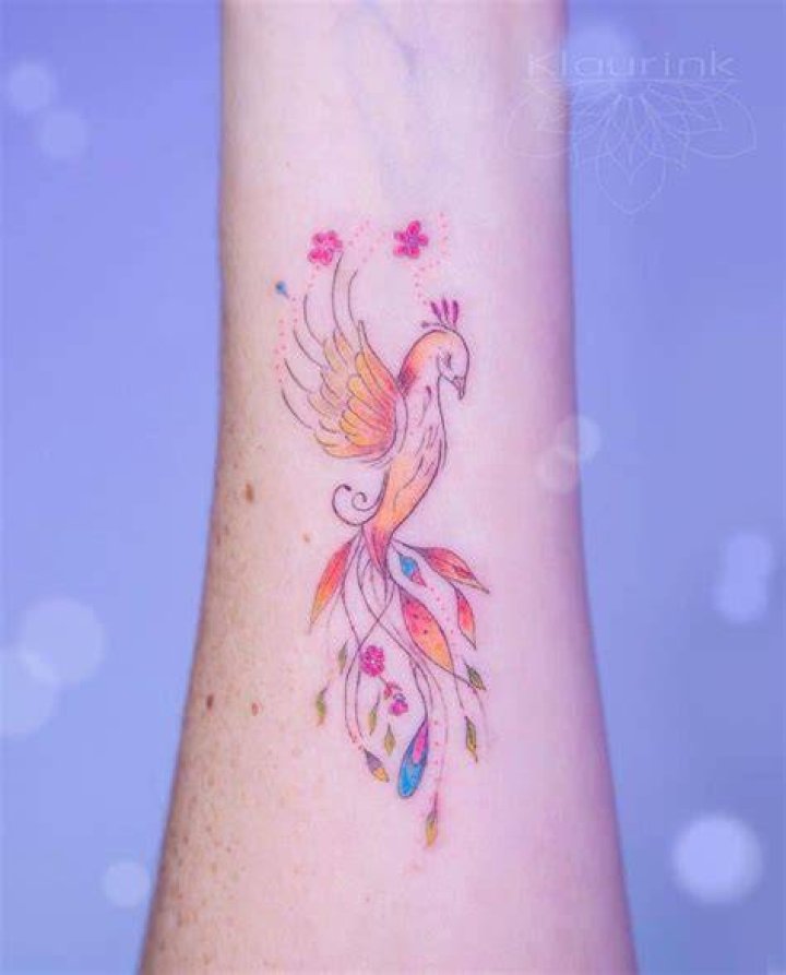 Phoenix Rising Feminine Tattoo klaurink