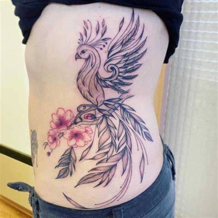 Phoenix Rising Feminine Tattoo mlle_bagheera_tattoo