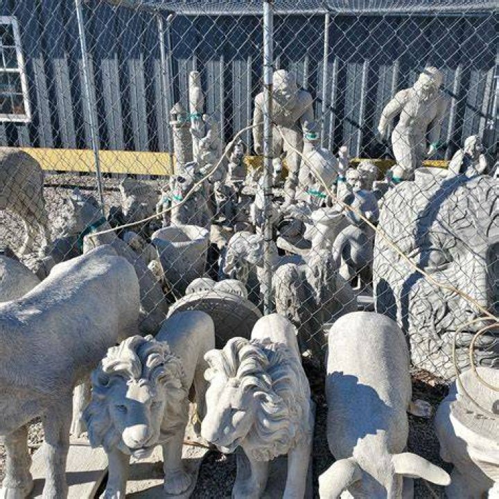  Pictured are statues of criminals wearing pistols at a ceramics workshop in San Cristobal, Venezuela