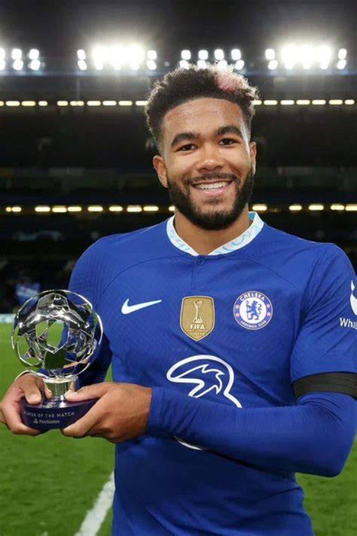 Reece James Holding His UEFA Champions League MOTM Trophy