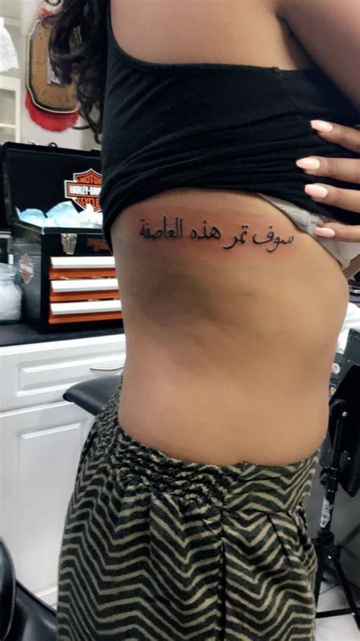 Rib Arabic Tattoos -_camp_carroll