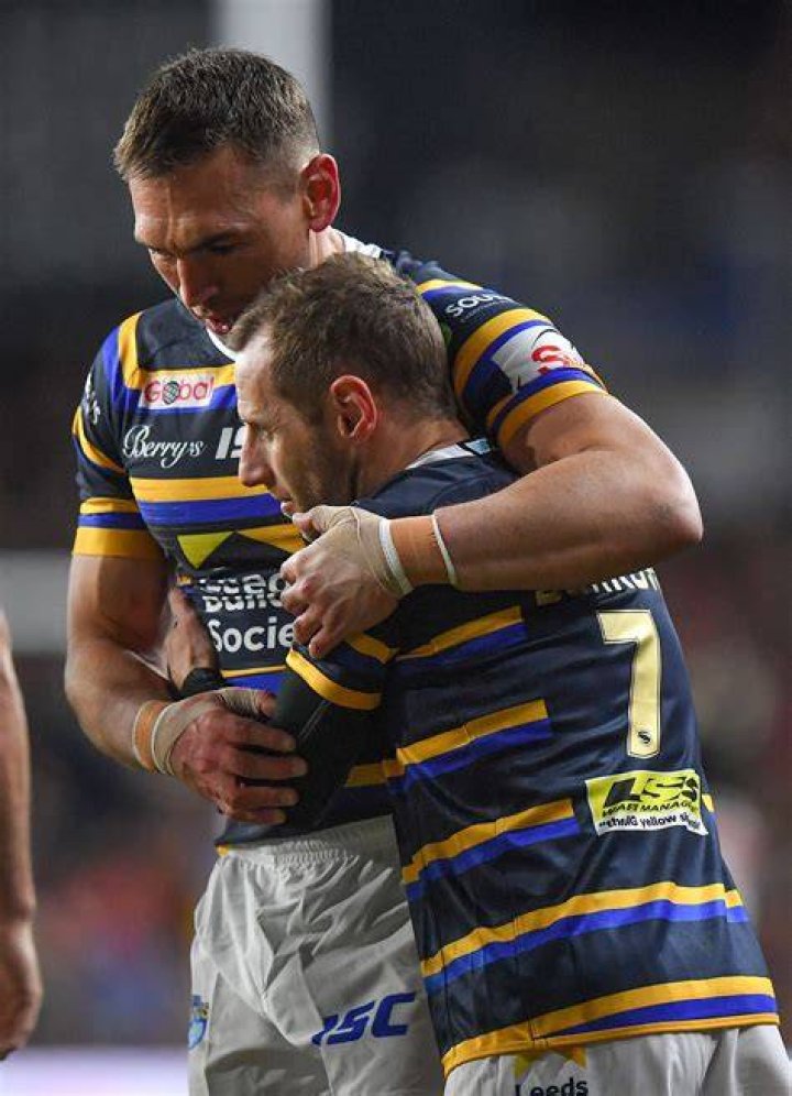 Rob Burrow, left, and Kevin Sinfield, right, are awarded with a CBE for raising awareness of motor neurone disease