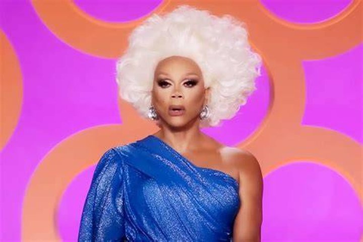 RuPaul's Drag Race finalist Sasha Colby receiving her royal scepter onstage after being crowned America's Next Drag Superstar.