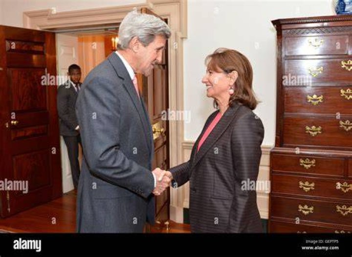 Secretary Kerry greets Executive Chairman Adani before meeting with Indian CEOs