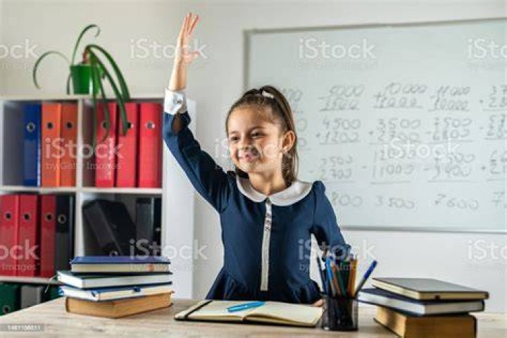  She then raises her hand and hits the tot