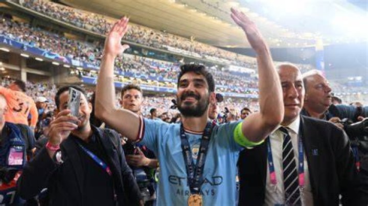 Skipper Ilkay Gundogan arrives at City's party alongside Sara Arfaoui