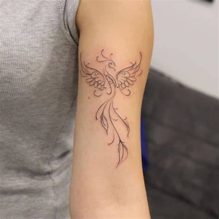 Small Phoenix Rising Tattoo meli_tattooart