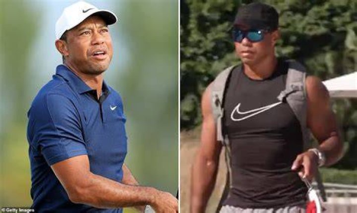  Sweat-soaked Tiger Woods with the American team at the Ryder Cup opening ceremony
