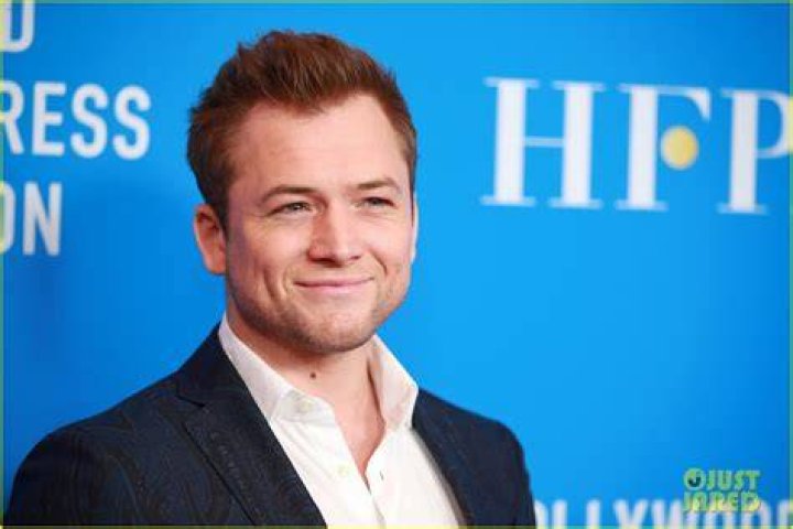 Taron Egerton Shows Off Some PDA With His Girlfriend At 'Rocketman