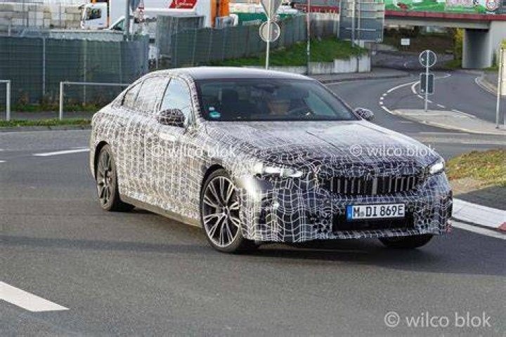  The BMW can be seen crashing into the tree after zooming around the corner